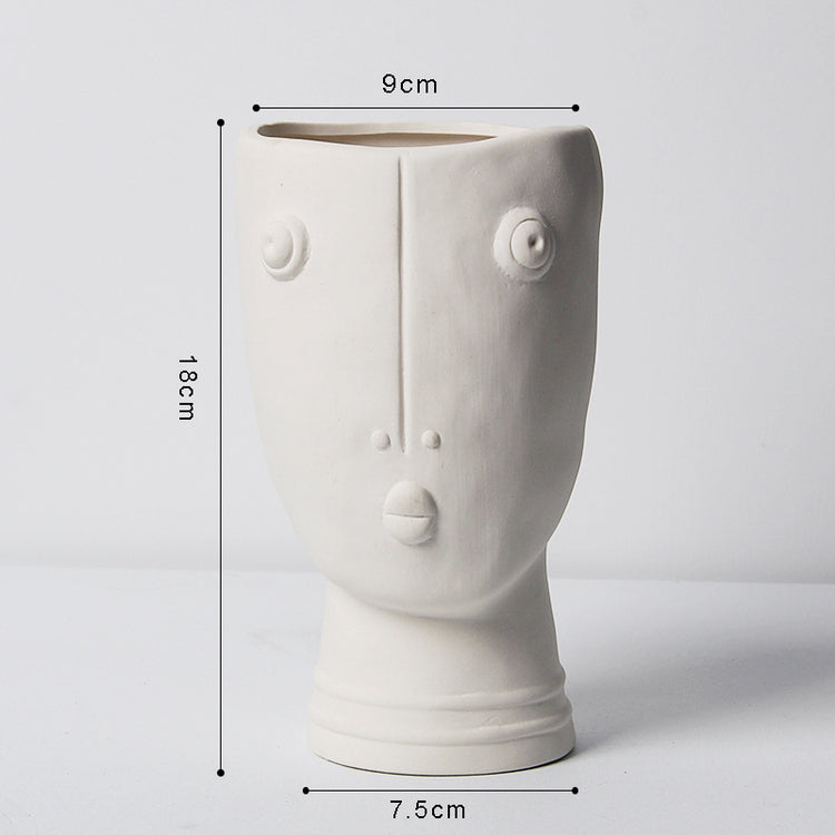 Ceramic abstract human face flower pot