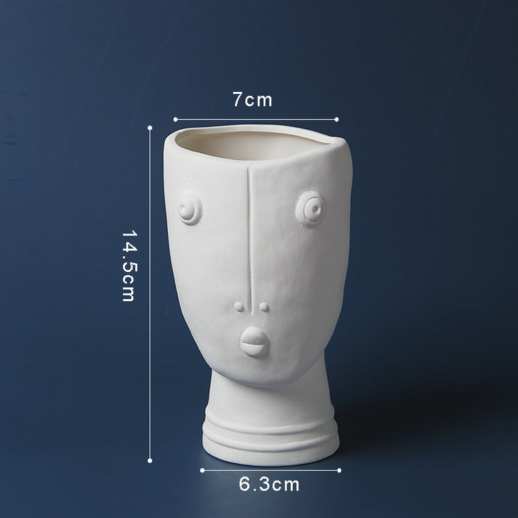 Ceramic abstract human face flower pot